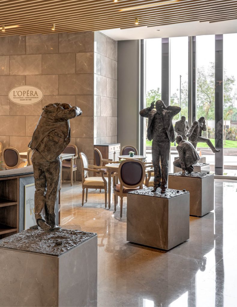 The Seven Ruhan Jansen Van Vuurnen bronze sculptures on bases displayed at the Touchbase lounge 