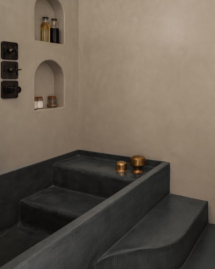 IPS and Neocement flooring by Colortek ground the design in; Sleek fittings and sanitary ware by Hansgrohe, Axor, Toto, Vitra and Kohler bring a refined contemporary edge; Photography by Ishita Sitwala
