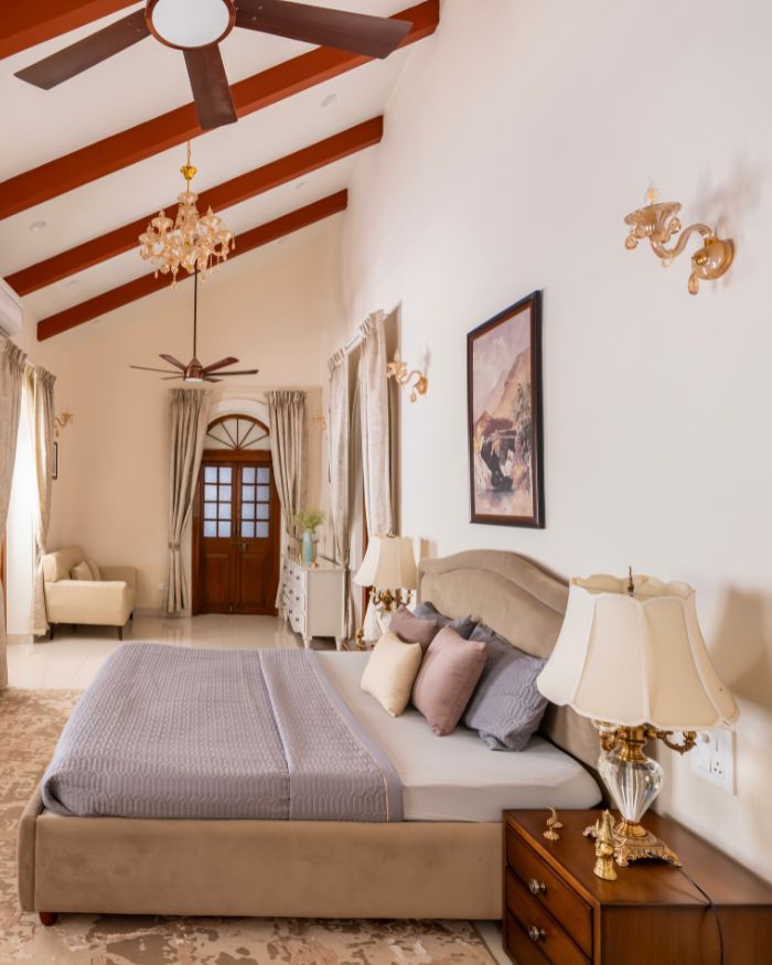 The master bedroom is decorated with pieces from OMA Living and Pure Home + Living, a custom side table. vanity and wall lamps and curtains and furnishings from D’Decor; Photography by Tushar Garg