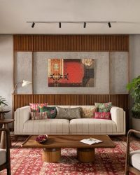 The sofa, console and coffee table is from Dtale, throw pillows from Good Earth, pots from Ferrocon Concrete Factory, rug from Obeetee, side table and armchairs from The Loft and painting from Kalakaari Haath. The texture paint is from Limocoat; Photography by Justin Sebastian